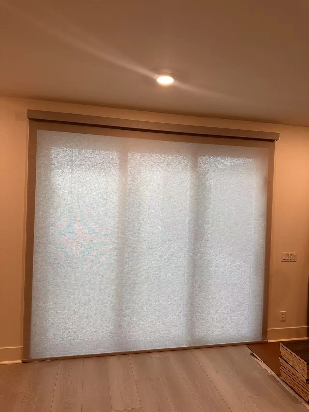 Motorized shades installed on residential windows