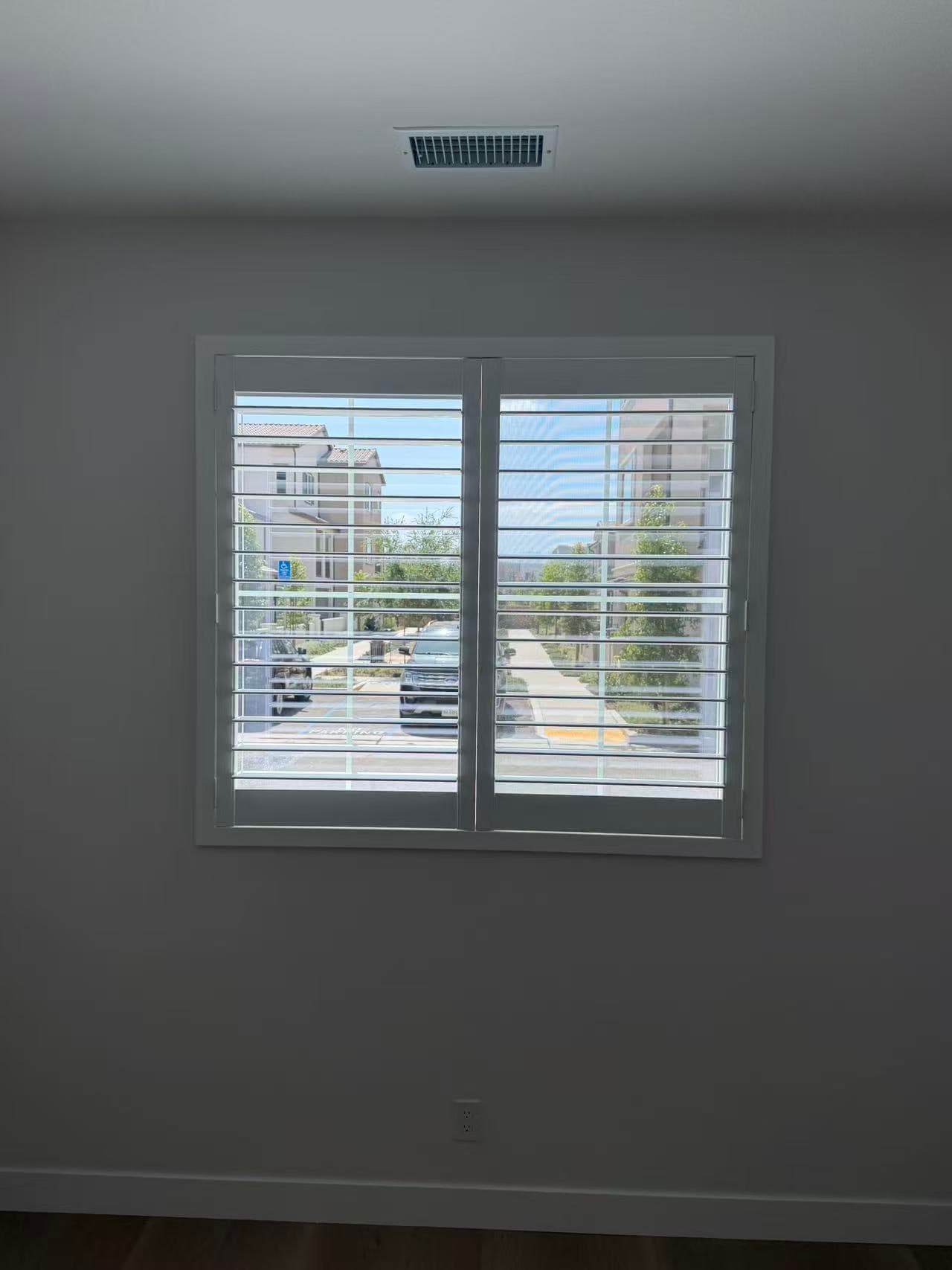 White plantation shutters installed in a Chino home